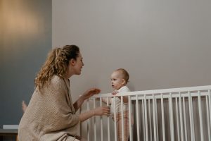 Mom and toddler in nursery