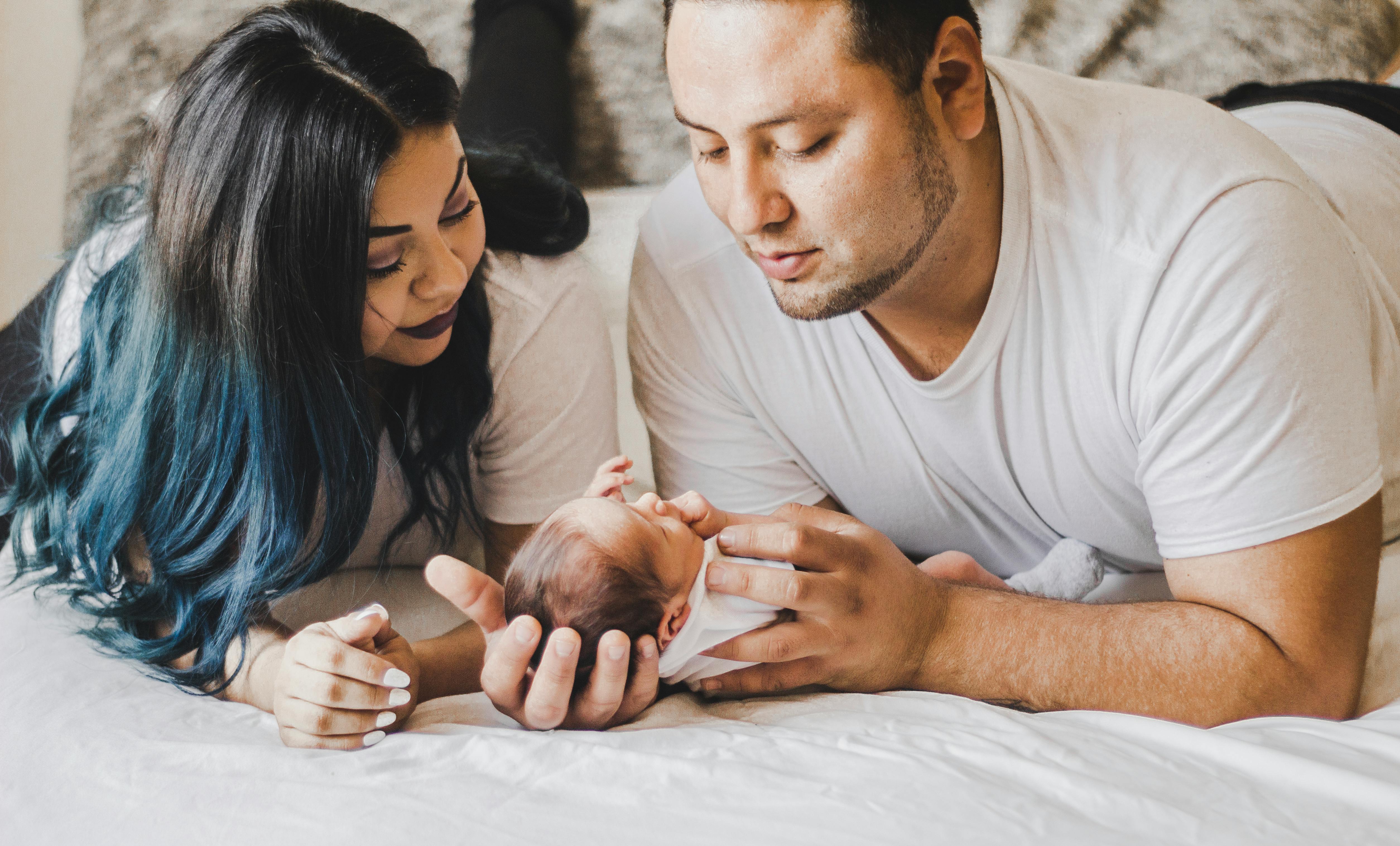 Parents with their baby this blog is about mental health