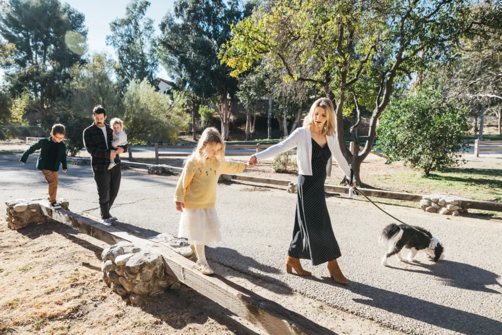 Allison Cantor walking with husband, three children, and dog